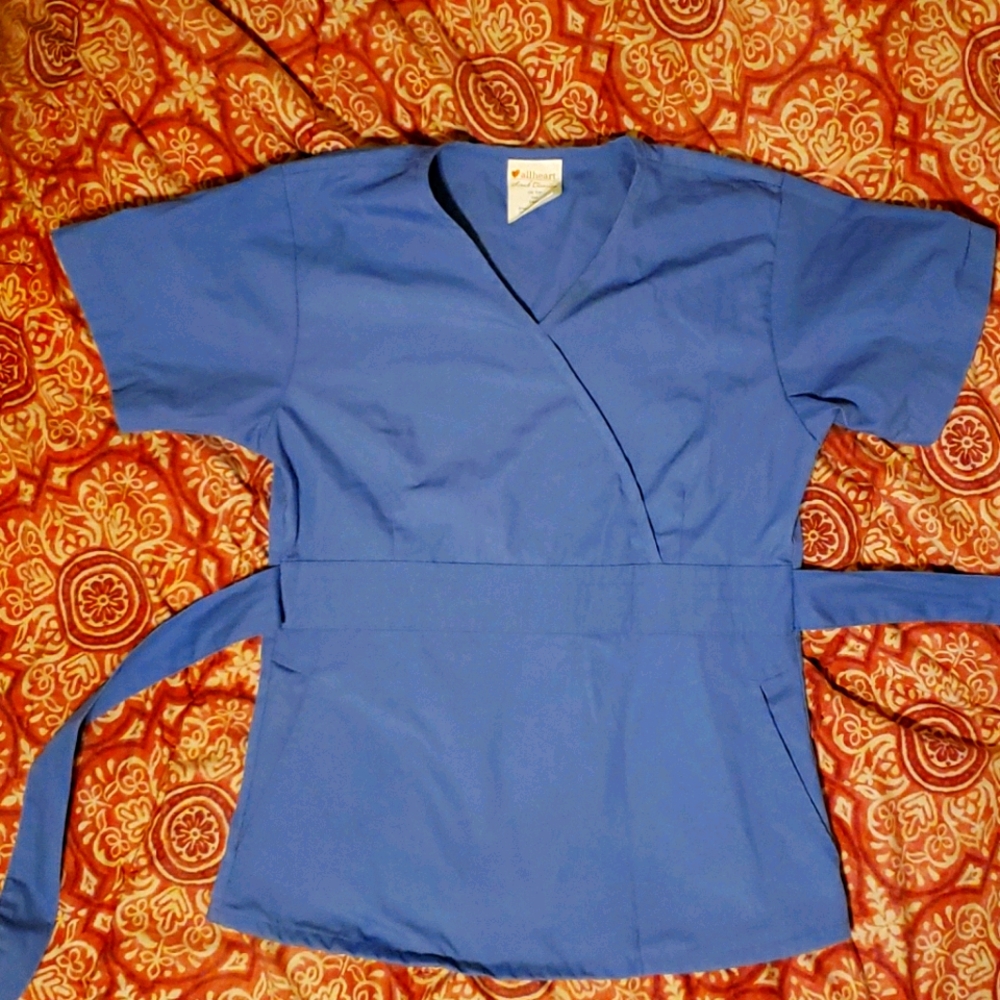 2 sets of scrubs (two tops, two bottoms)